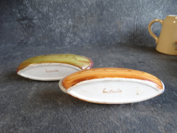 Pair of Canadian Porcelain Canoe Planters A2367