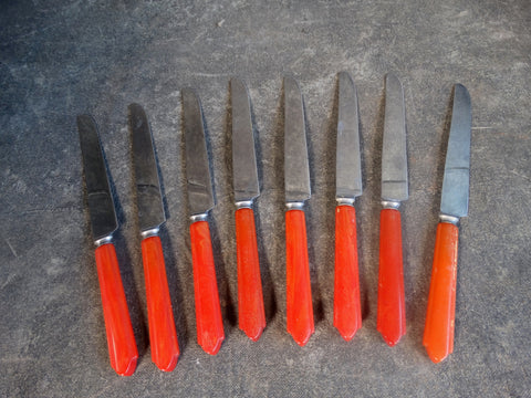 8 Red Bakelite Knives with Pointed Handles A2821