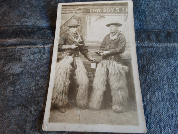 Authentic circa 1900 Photo Postcard of a pair of Cowboys Playing It Up AP1738