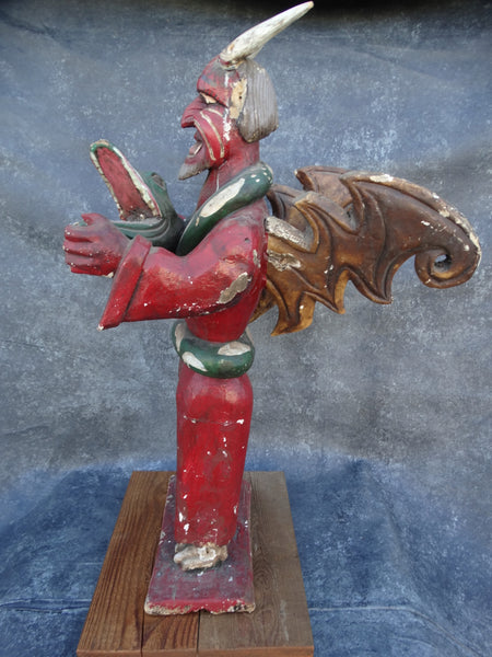 Winged Mexican Devil Wrapped in the Close Embrace of a Serpent Handcarved