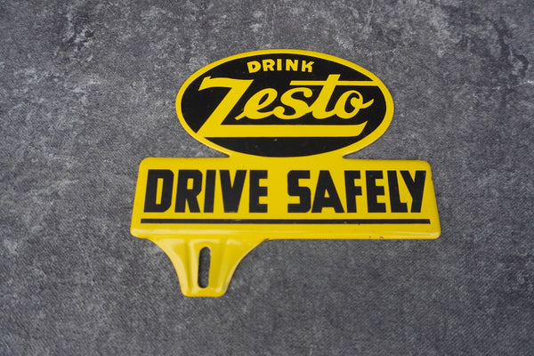 Drink Zesto Drive Safely Tin Litho License Plate Topper  AP1805