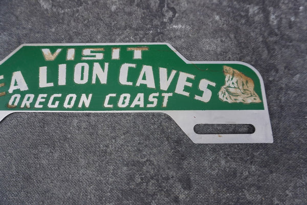 Visit Sea Lion Caves Oregon Coast Tin Litho License Plate Topper  AP1809