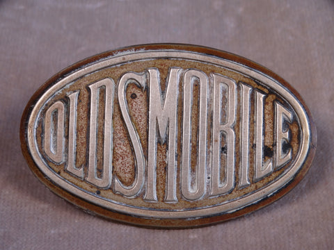 Oldsmobile Nickel & Brass Radiator Badge A2459
