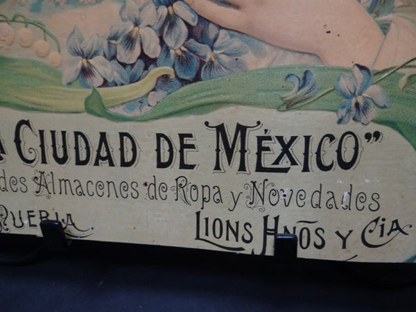 Mexican Calendar Chromo: La Ciudad de Mexico-Lady with a Cherub on her Shoulder