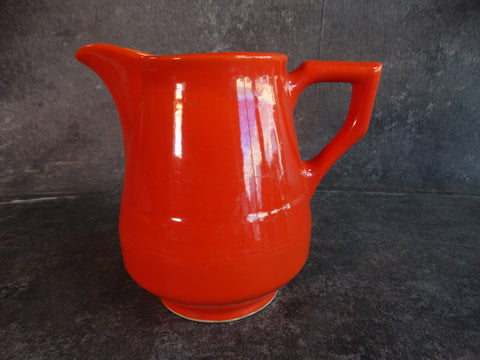 Vernon Kilns Early America Milk Pitcher in Orange CA2355