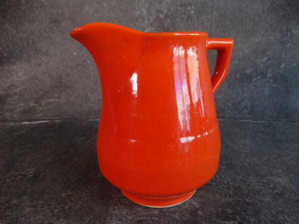 Vernon Kilns Early America Milk Pitcher in Orange CA2355