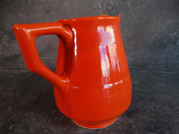 Vernon Kilns Early America Milk Pitcher in Orange CA2355