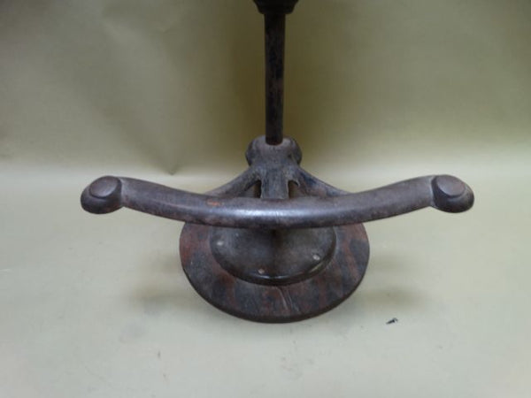 Brown wood and iron stool