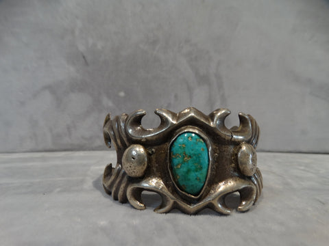 Navajo Sand cast Silver Cuff with Turquoise center stone J2009