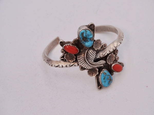 Nabvajo Silver Cuff, Turquoise & Coral Stones in an Unusual Floral and Leaf Center Mount Setting J588