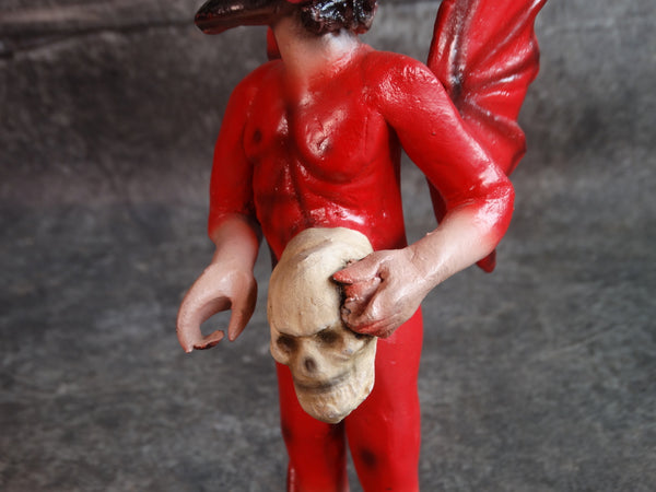 Mexican Winged Diablo Holding a Skull M2882